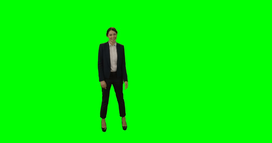 Businesswoman in Suit Smiling with Green Screen Background - Free Images, Stock Photos and Pictures on Pikwizard.com