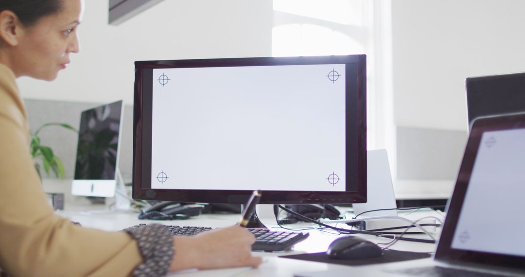 Businesswoman in Modern Office Working on Clean Slate Display