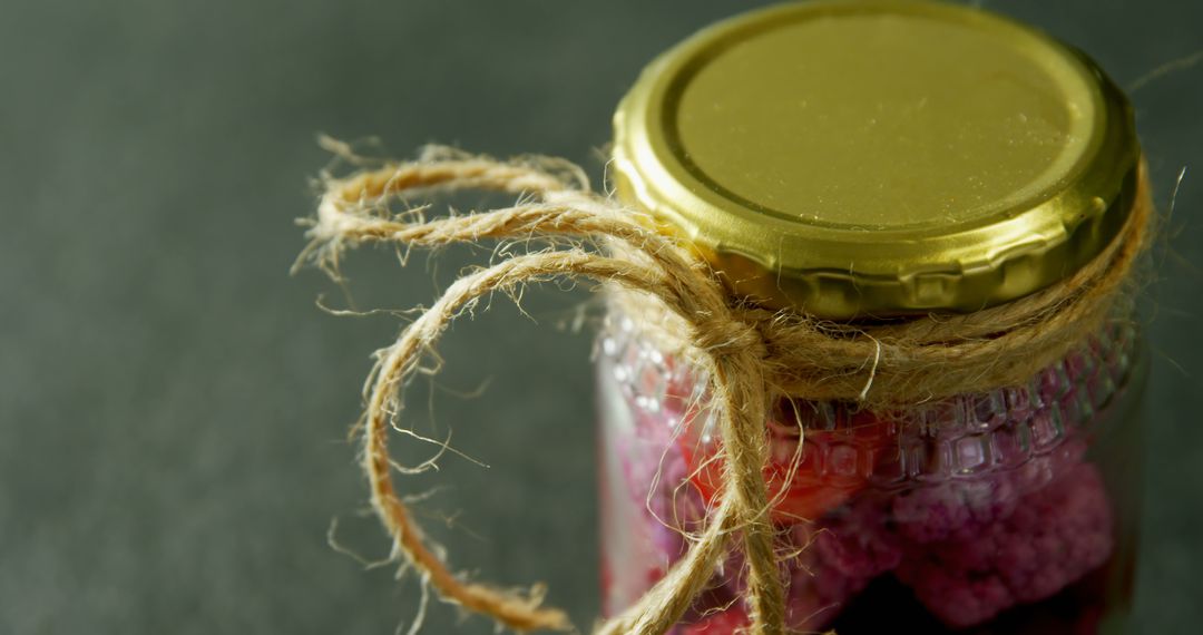 Jar of Homemade Preserves with Twine Decoration - Free Images, Stock Photos and Pictures on Pikwizard.com