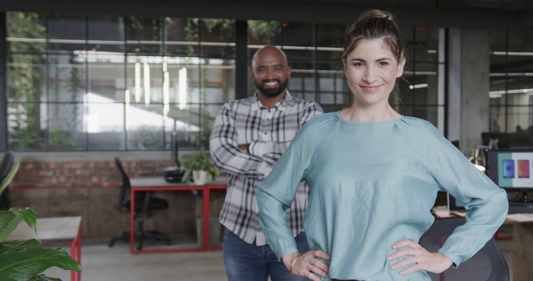 Smiling Colleagues in Modern Office Environment