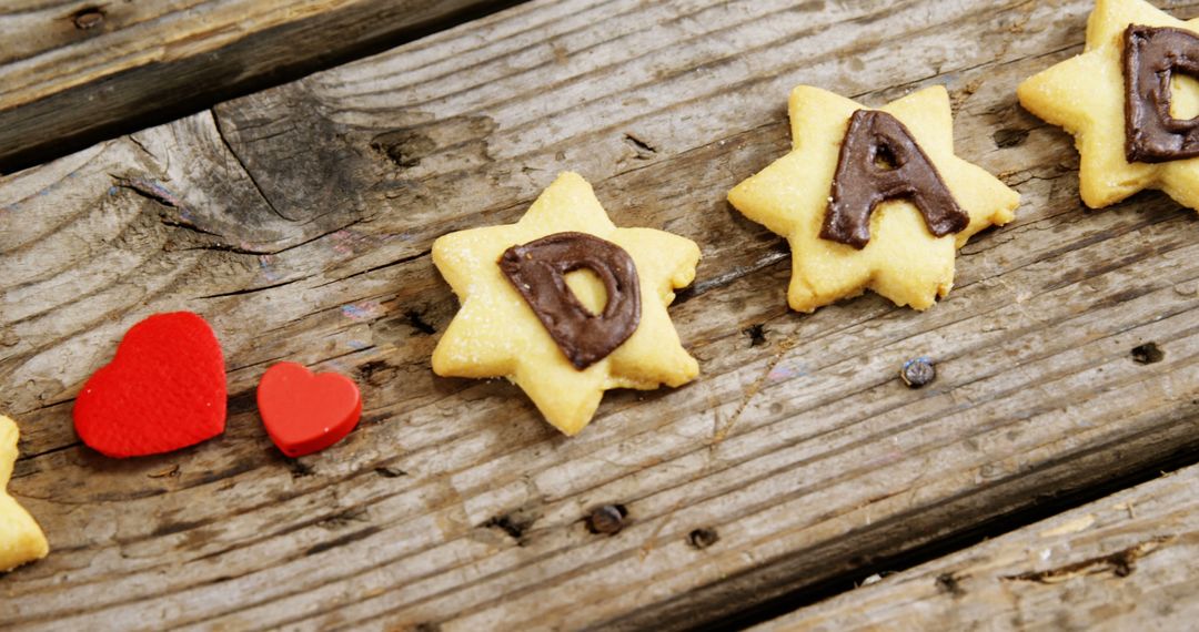 Star Shaped Cookies with 'Dad' Message on Rustic Wooden Surface - Free Images, Stock Photos and Pictures on Pikwizard.com