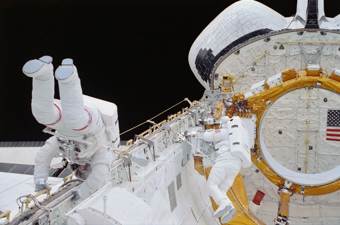 EVA Crewmembers working in the payload bay. - Free Images, Stock Photos and Pictures on Pikwizard.com