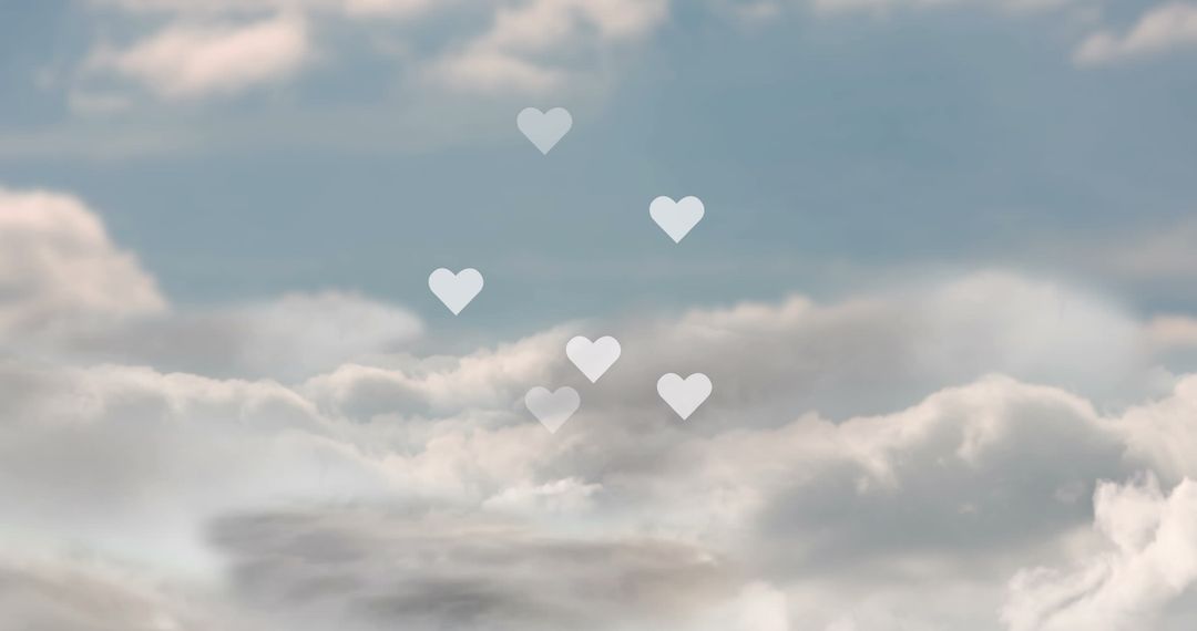 Floating Hearts Over Cloudscape Symbolizing Love and Serenity