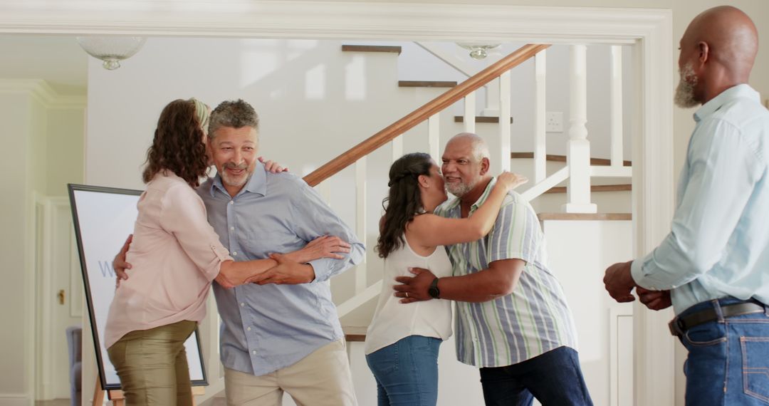 Diverse Group of Friends Joyfully Reuniting in Warm Home