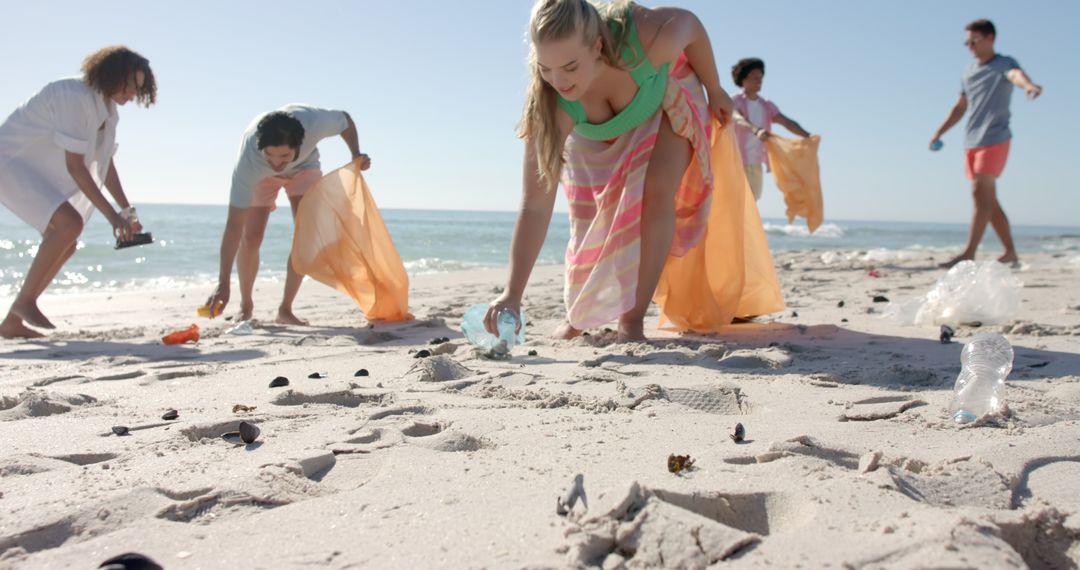 Diverse Group of Volunteers Cleaning Beach Promoting Environmental Responsibility
