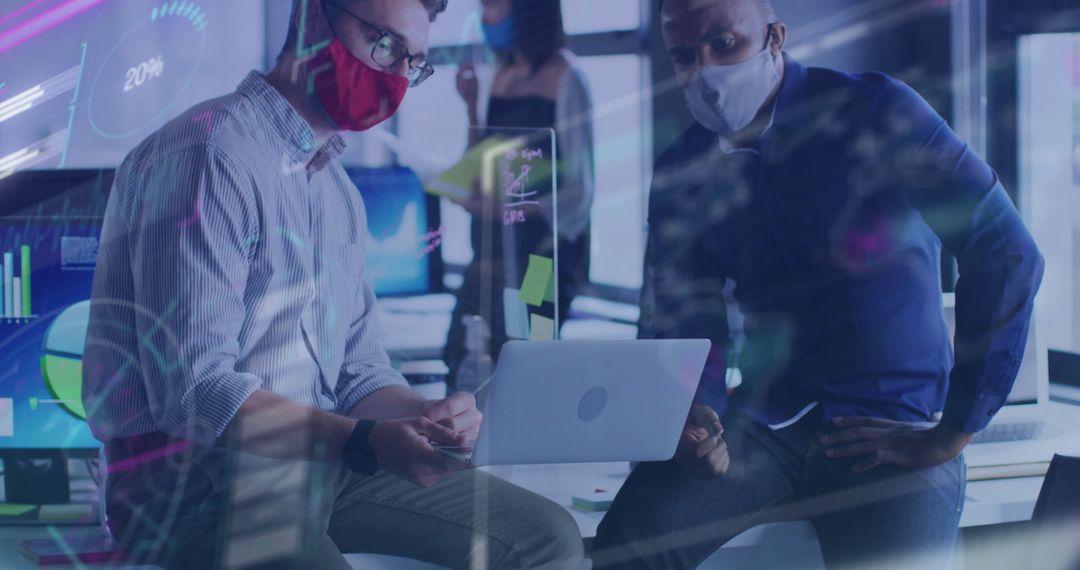 Business Colleagues Analyzing Financial Data with Masks in Office