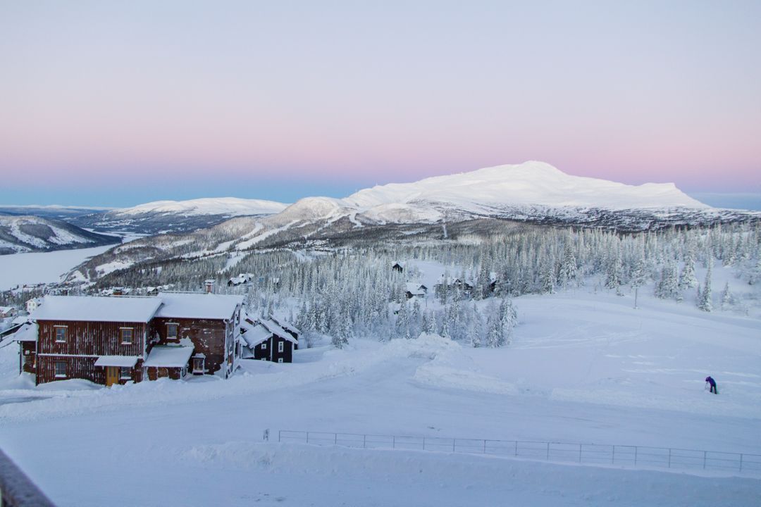 Snowy Mountain Village at Sunrise in Winter - Free Images, Stock Photos and Pictures on Pikwizard.com