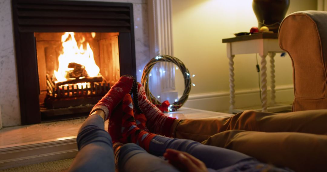 Cozy Winter Evening by Fireplace with Family Socks - Free Images, Stock Photos and Pictures on Pikwizard.com