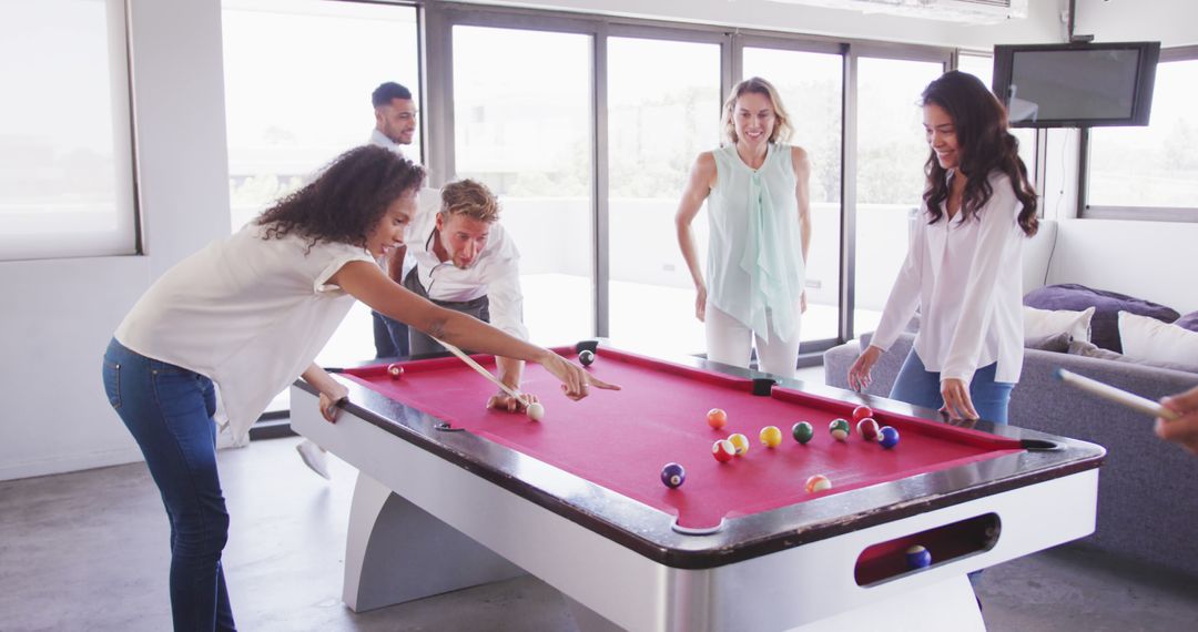 Business Colleagues Enjoying a Recreational Pool Game