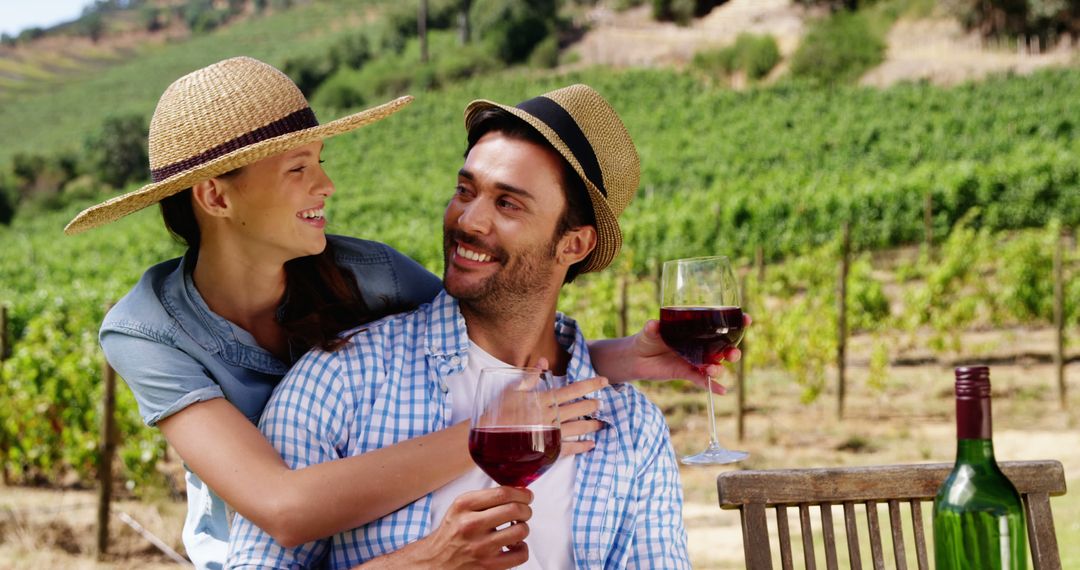 A couple shares a romantic wine moment in a scenic vineyard. - Free Images, Stock Photos and Pictures on Pikwizard.com