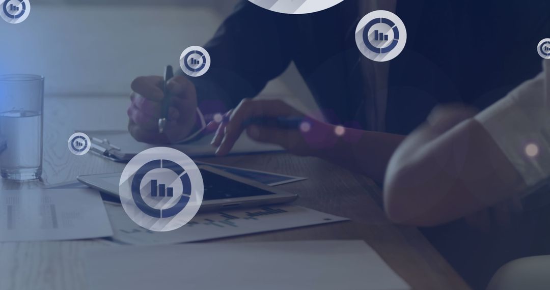 Business Colleagues Analyzing Report with Digital Analytics Concept