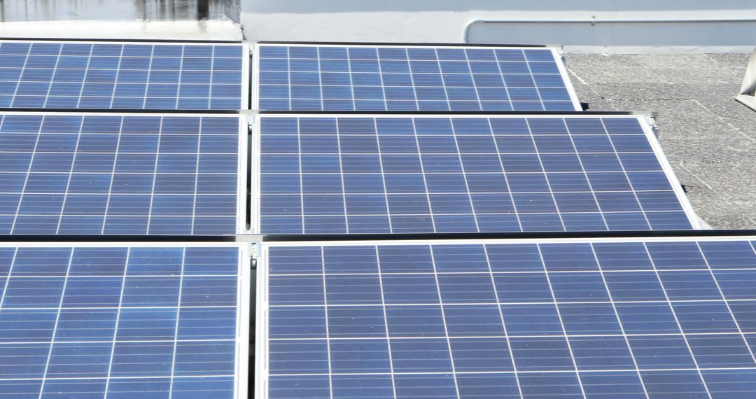 Close-Up of Solar Panels on Rooftop During Daytime - Free Images, Stock Photos and Pictures on Pikwizard.com