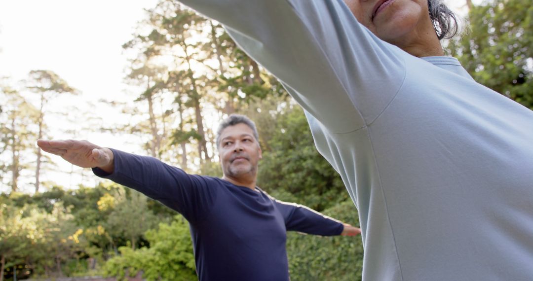 Senior Couple Practicing Yoga in Nature Park - Free Images, Stock Photos and Pictures on Pikwizard.com