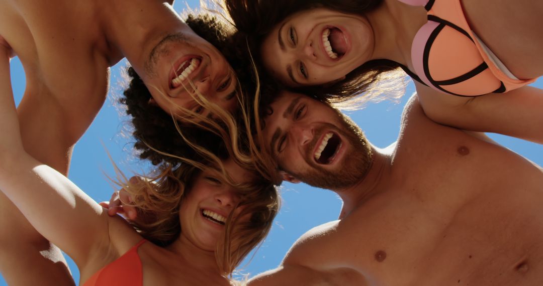 Group of Friends Enjoying a Summer Day at the Beach - Free Images, Stock Photos and Pictures on Pikwizard.com