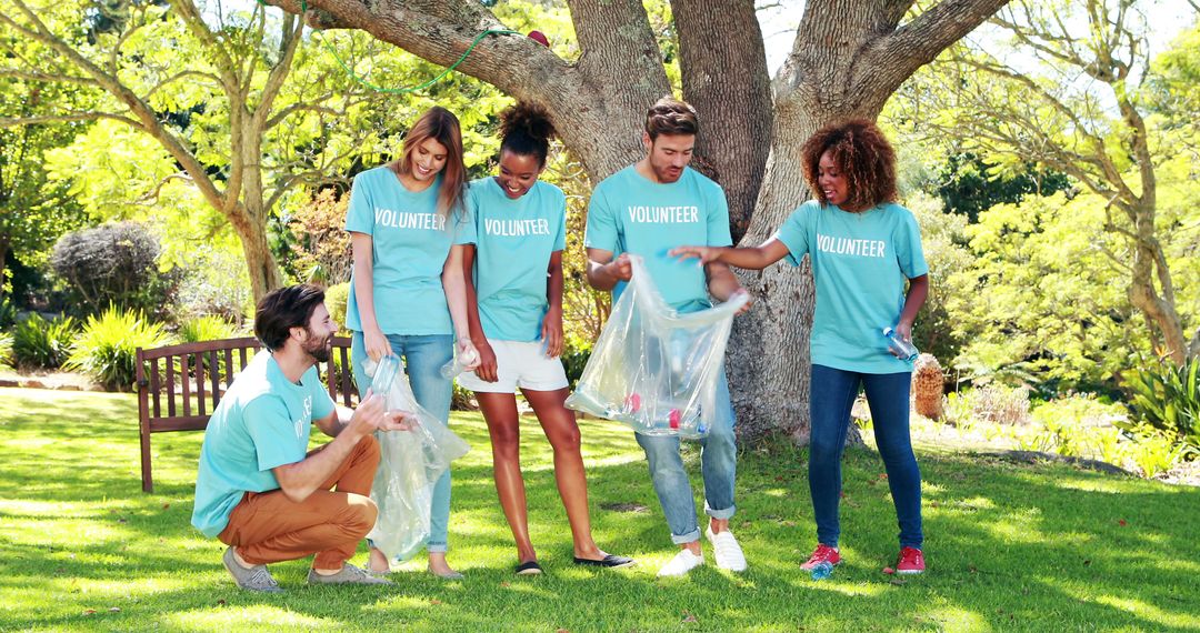 Diverse Group of Volunteers Picking Up Trash in Park - Free Images, Stock Photos and Pictures on Pikwizard.com