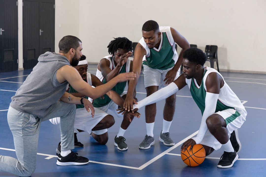 Basketball Coach Motivating Diverse Team During Huddle