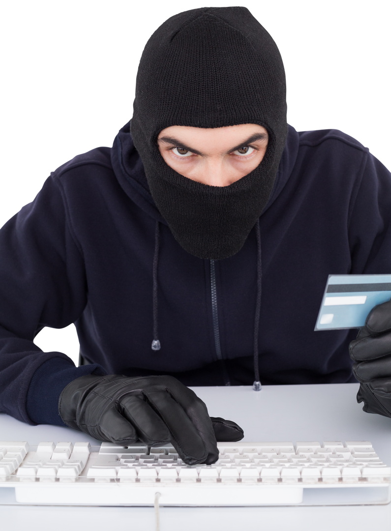 Masked Burglar Hacking Computer with Credit Card on Transparent Background - Download Free Stock Images Pikwizard.com