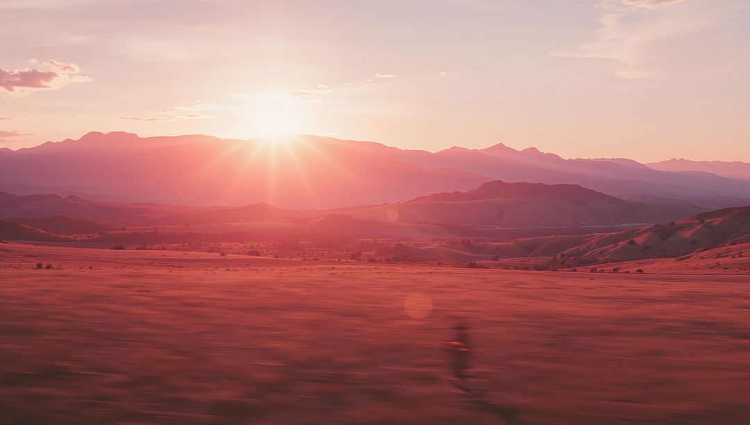 Sunlit Tranquil Grassland with Jogger in Dynamic Sunrise Scene