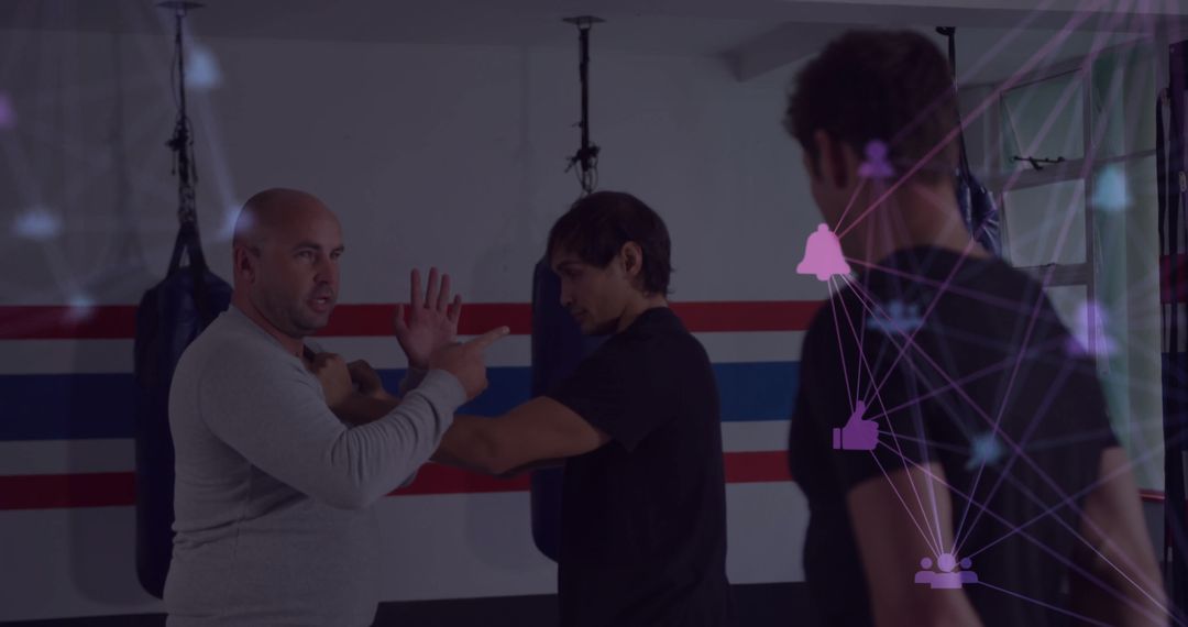 Instructor Teaching Wrist Control Move in Gym with Digital Overlay