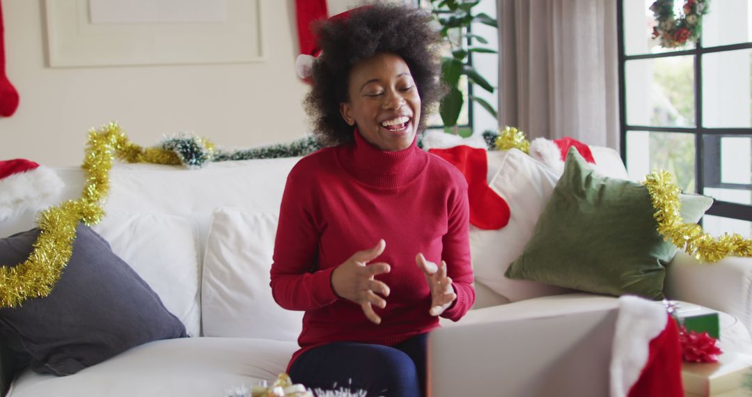 Woman Enjoying Virtual Christmas Celebration at Home - Free Images, Stock Photos and Pictures on Pikwizard.com