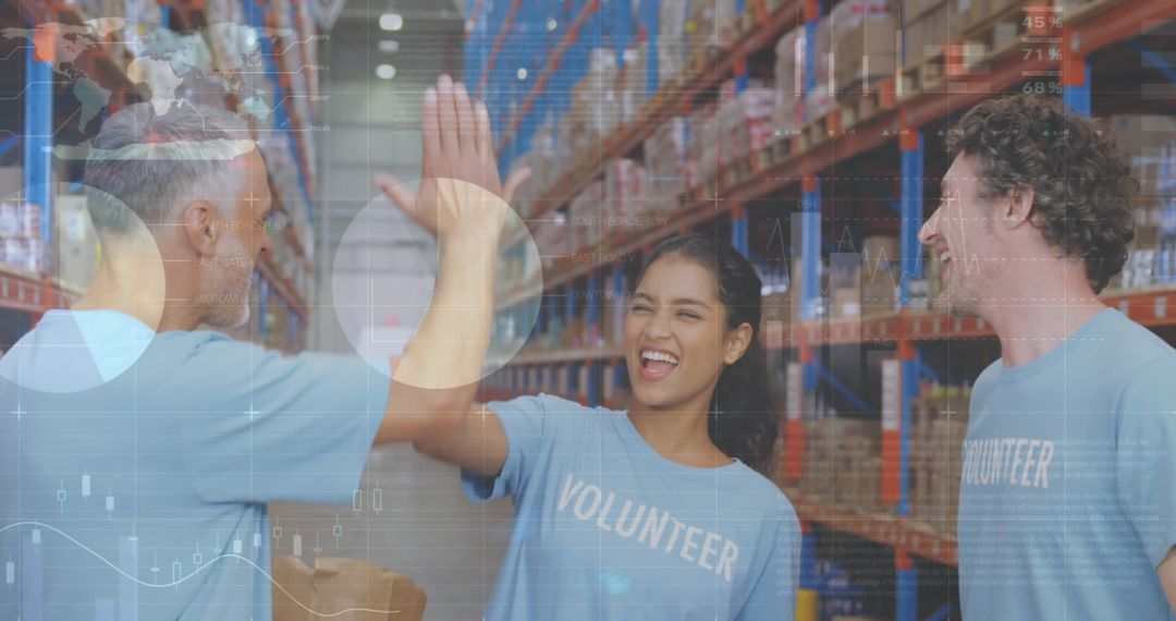 Enthusiastic Volunteers Celebrating in Warehouse with Overlay Data Graphics