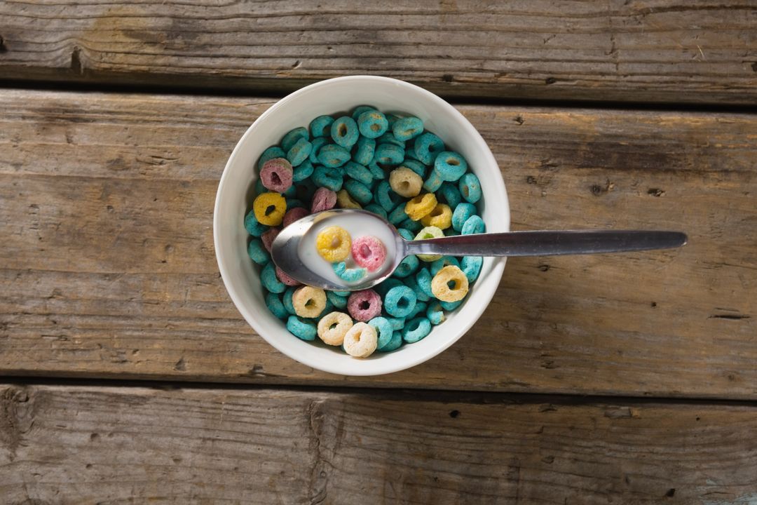 Bowl of froot loops with spoon - Free Images, Stock Photos and Pictures on Pikwizard.com