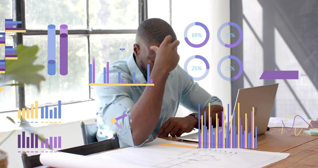 Focused Analyst Leaning Over Blueprints with Digital Analytics Interface