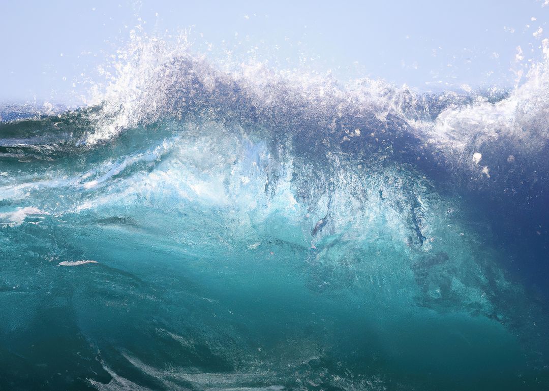 Vibrant Ocean Wave Crashing Under Clear Blue Sky - Free Images, Stock Photos and Pictures on Pikwizard.com