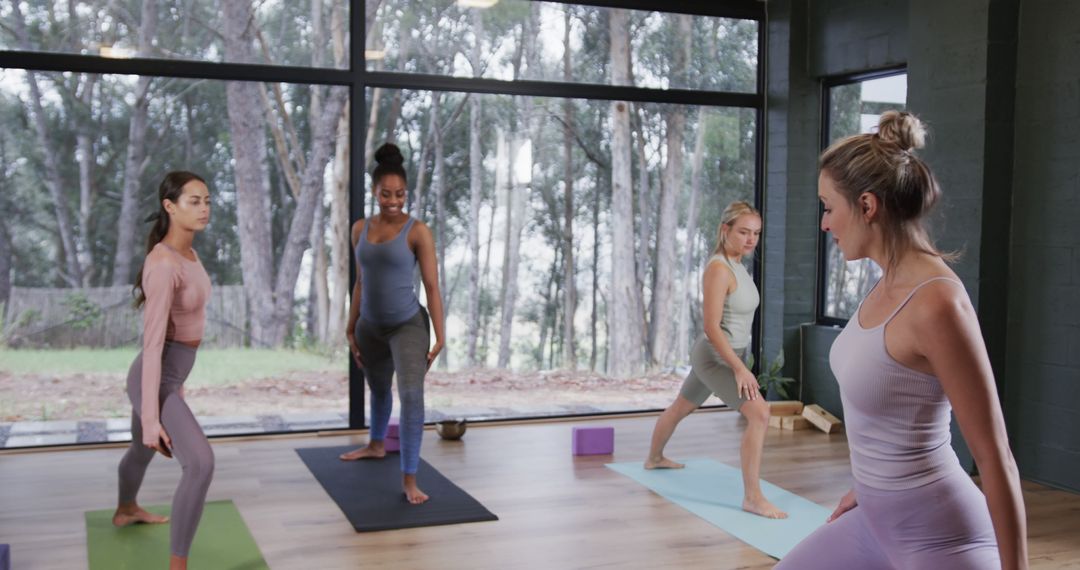 Diverse Women Practicing Yoga in Serene Studio - Free Images, Stock Photos and Pictures on Pikwizard.com