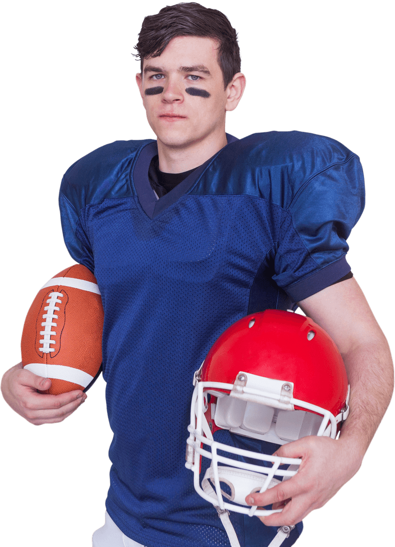 American Football Player Holding Ball and Helmet with Focus