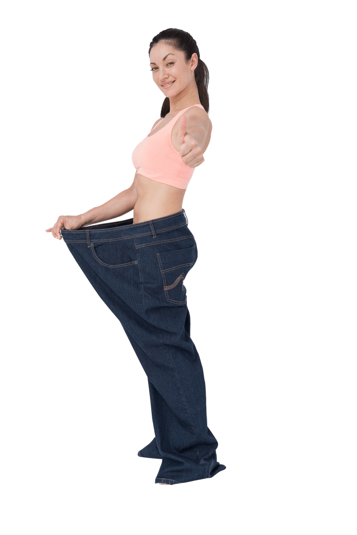 Smiling Woman Surrounded by Sucessfully Transparent Oversized Jeans