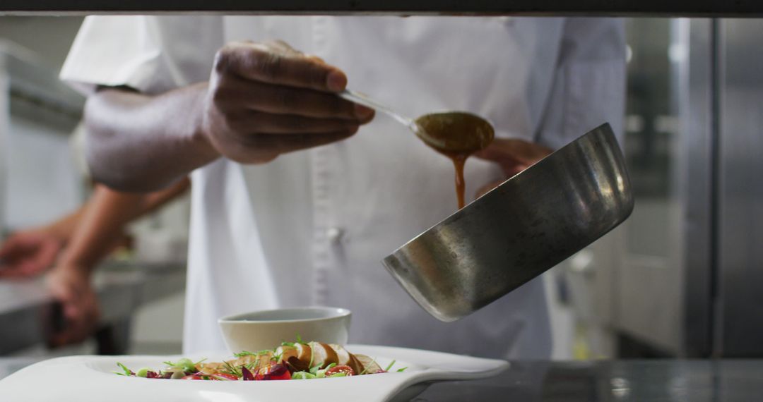 Chef Plating Gourmet Dish in Restaurant Kitchen - Free Images, Stock Photos and Pictures on Pikwizard.com