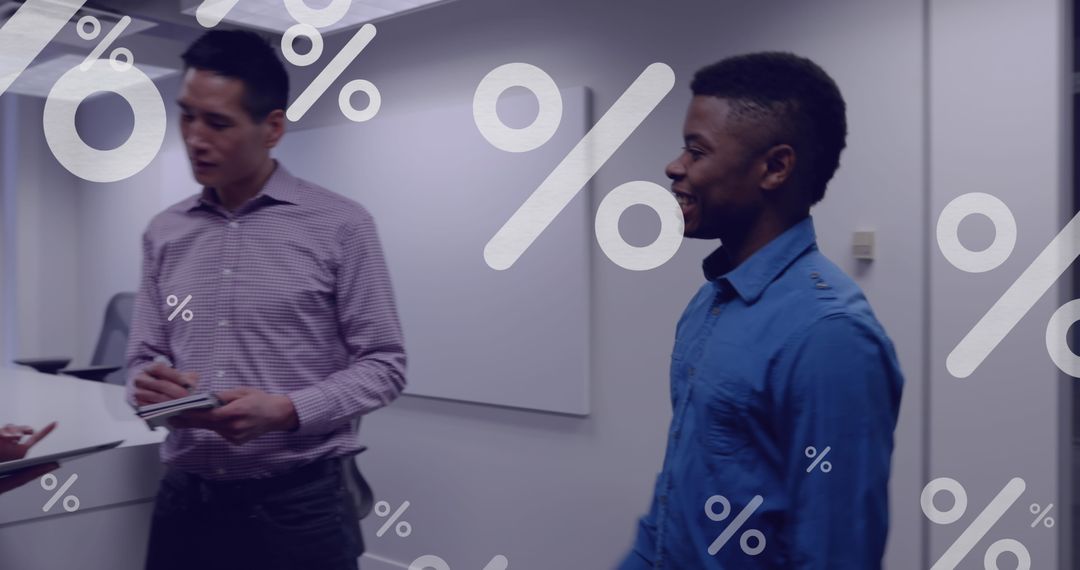 Diverse Business Team Analyzing Statistics in Modern Office