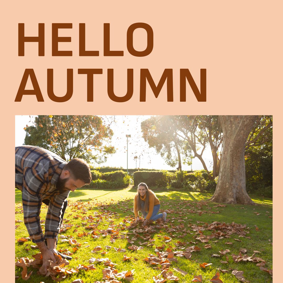 Couple Enjoying Autumn Day Collecting Fallen Leaves in Park