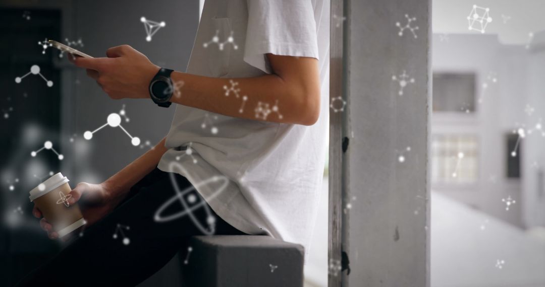 Young Man Engaging with Technology and Science Symbols