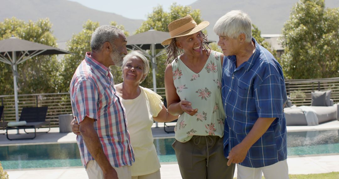 Smiling Group of Seniors Bonding by the Pool - Free Images, Stock Photos and Pictures on Pikwizard.com