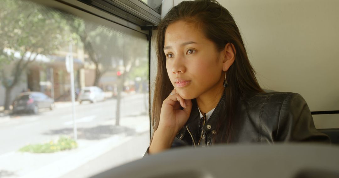 Young Woman Reflecting While Traveling on Bus - Free Images, Stock Photos and Pictures on Pikwizard.com