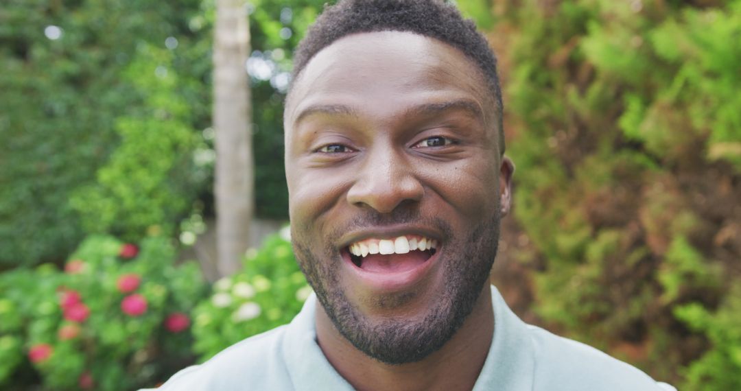 Smiling African American Man Enjoying Garden Serenity