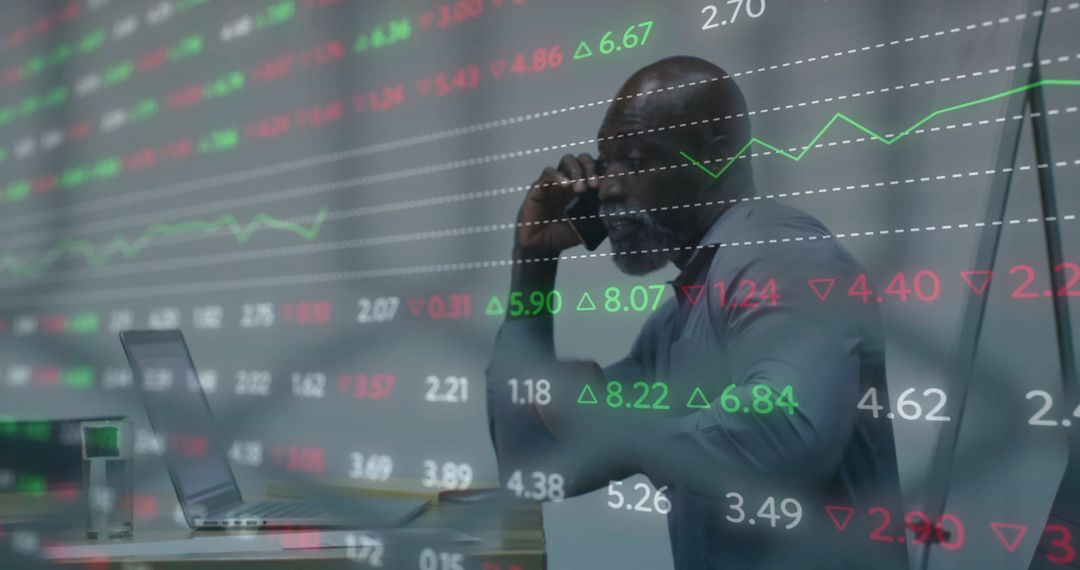 Business Professional Analyzing Stock Market Data While on Call