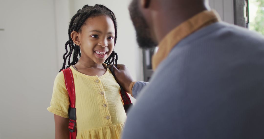Father Encouraging Daughter Before School Day Begins