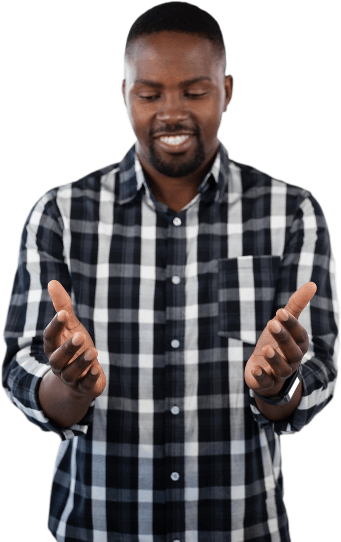 Happy Young Man Gesturing with Hands Open in Plaid Shirt