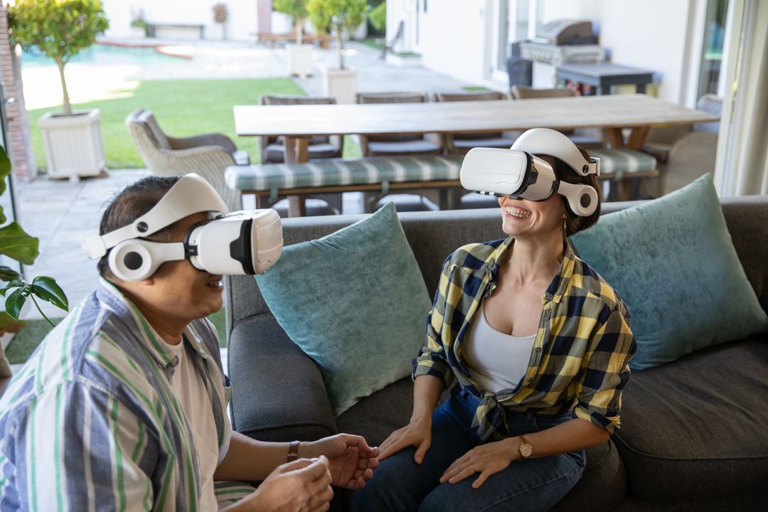 Couple Enjoying Virtual Reality Experience on Sofa