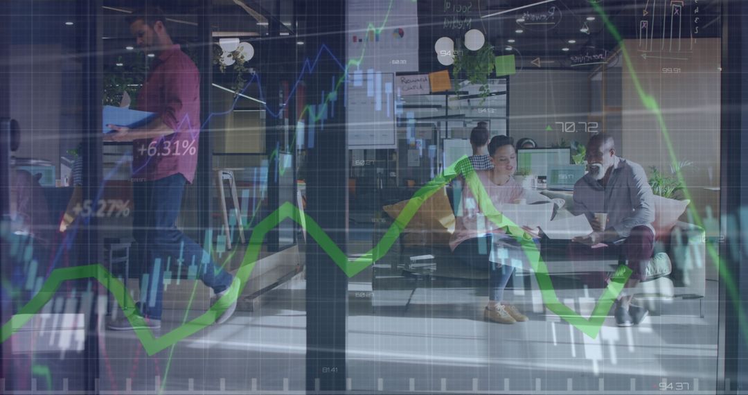 Forward-Thinking Business Team Analyzing Financial Data in Modern Office