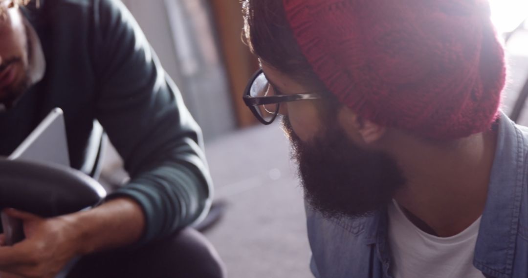 Two Mechanics Collaborating and Repairing Bicycle