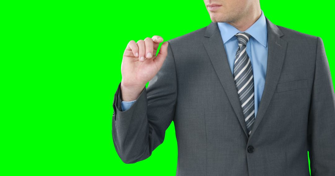 Businessman Wearing Suit Gesturing with Green Background - Free Images, Stock Photos and Pictures on Pikwizard.com