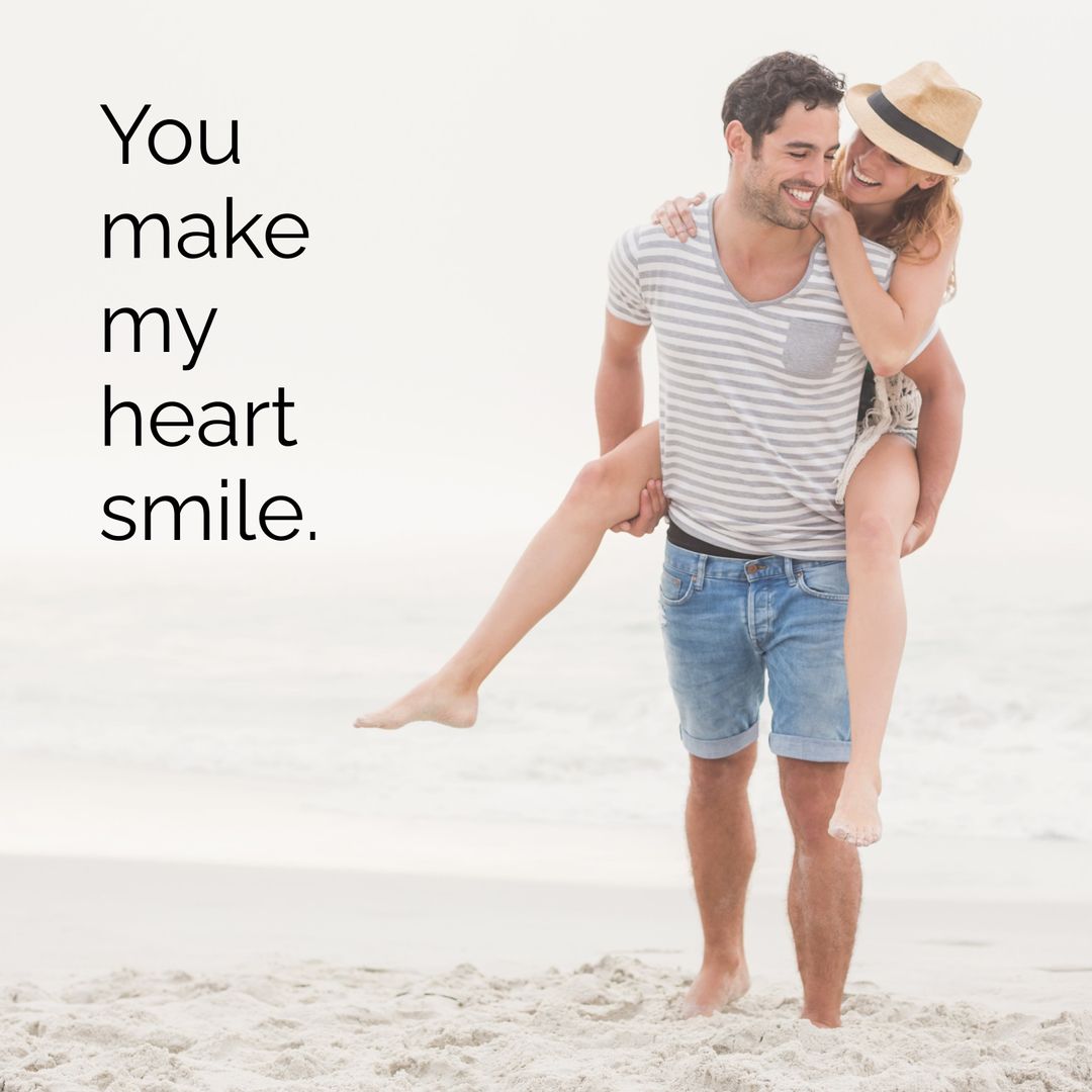 Joyful Couple Embracing Playful Beach Moment