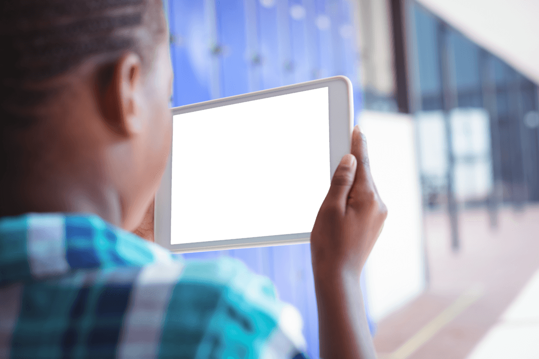 Transparent Tablet Capturing School Corridor Scene