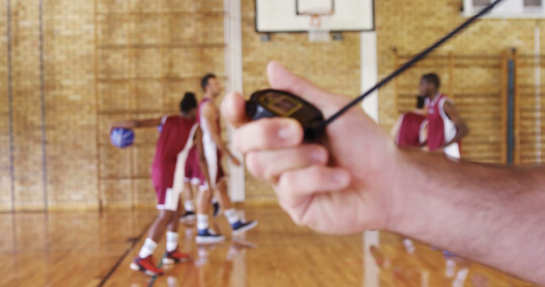 Coach Timing Basketball Players Training in Gym - Free Images, Stock Photos and Pictures on Pikwizard.com