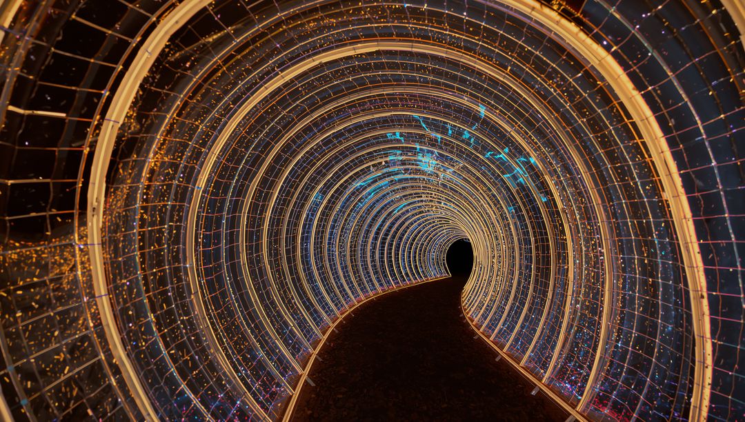 Glowing LED Tunnel in Dark Park Landscape