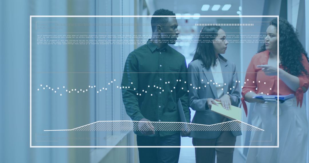 Diverse Colleagues Analyzing Business Data in Office Corridor